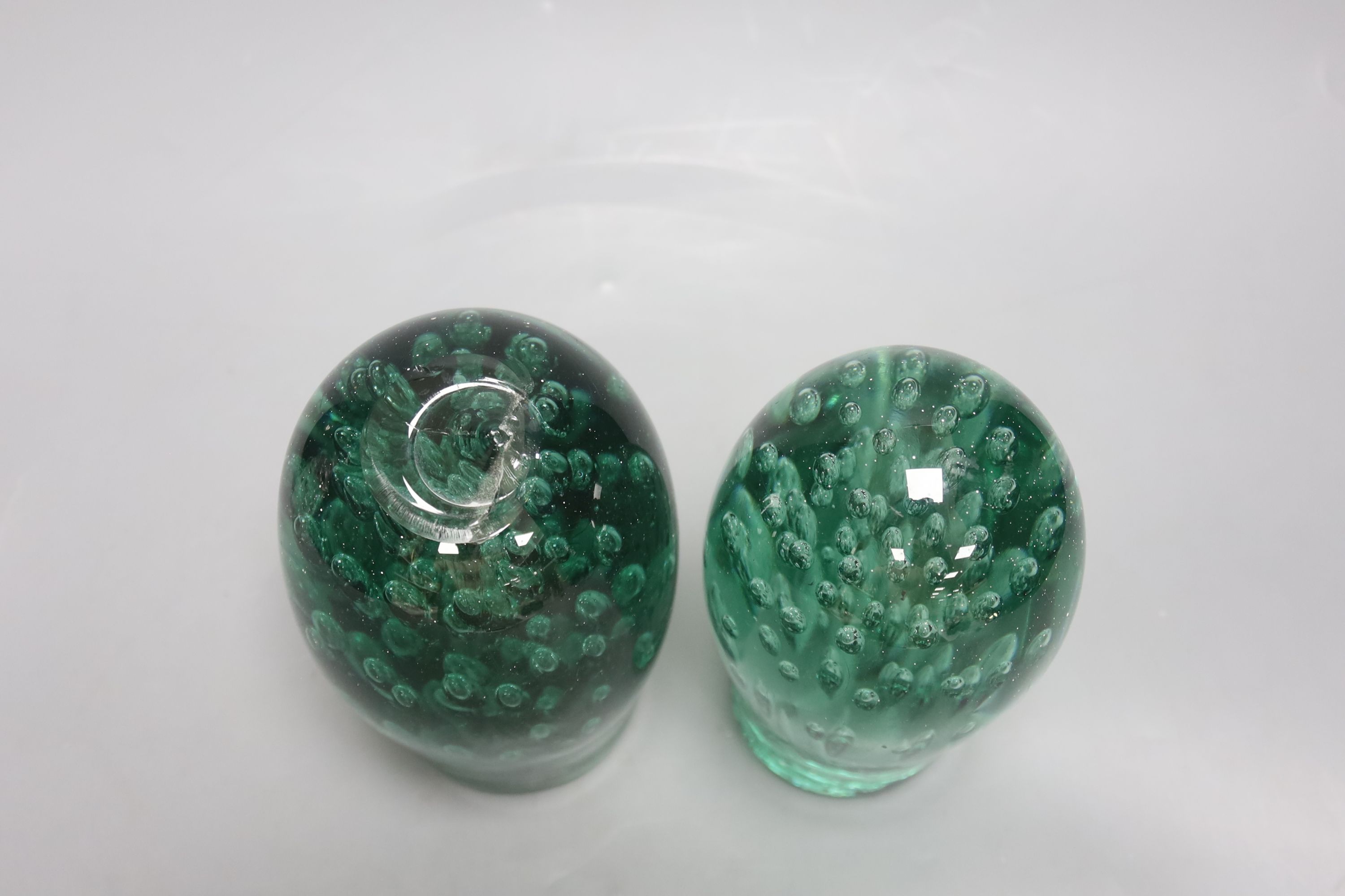 Two green glass dumps, a heavy cut glass bowl and a decanter